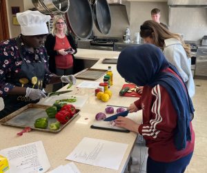 Cooking classes share classic recipes as part of Welcome Neighbor’s supper club program