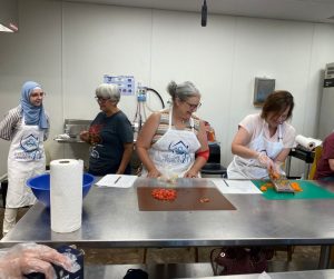 Cooking classes share classic recipes as part of Welcome Neighbor’s supper club program